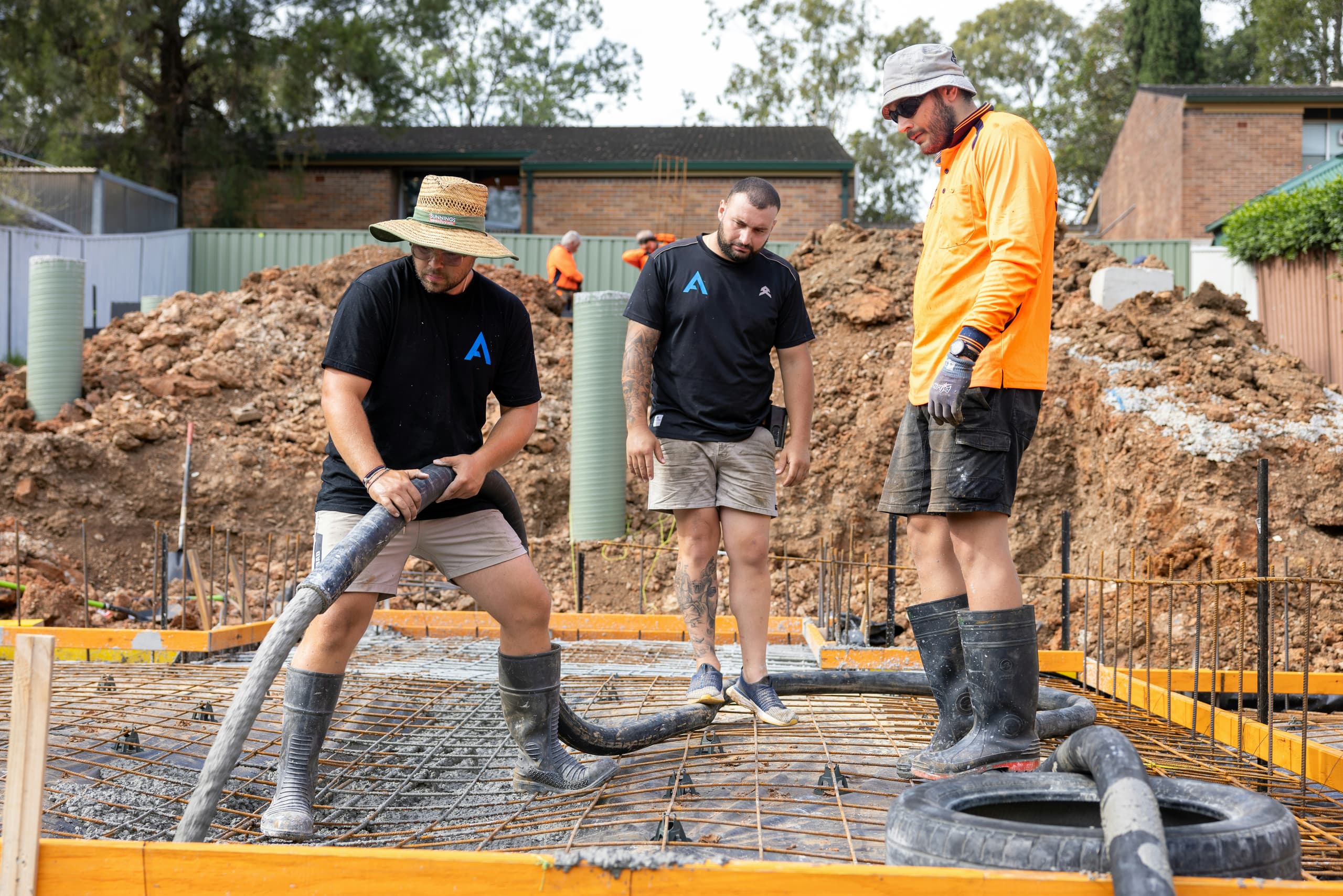 Concrete being placed into a foundation pour