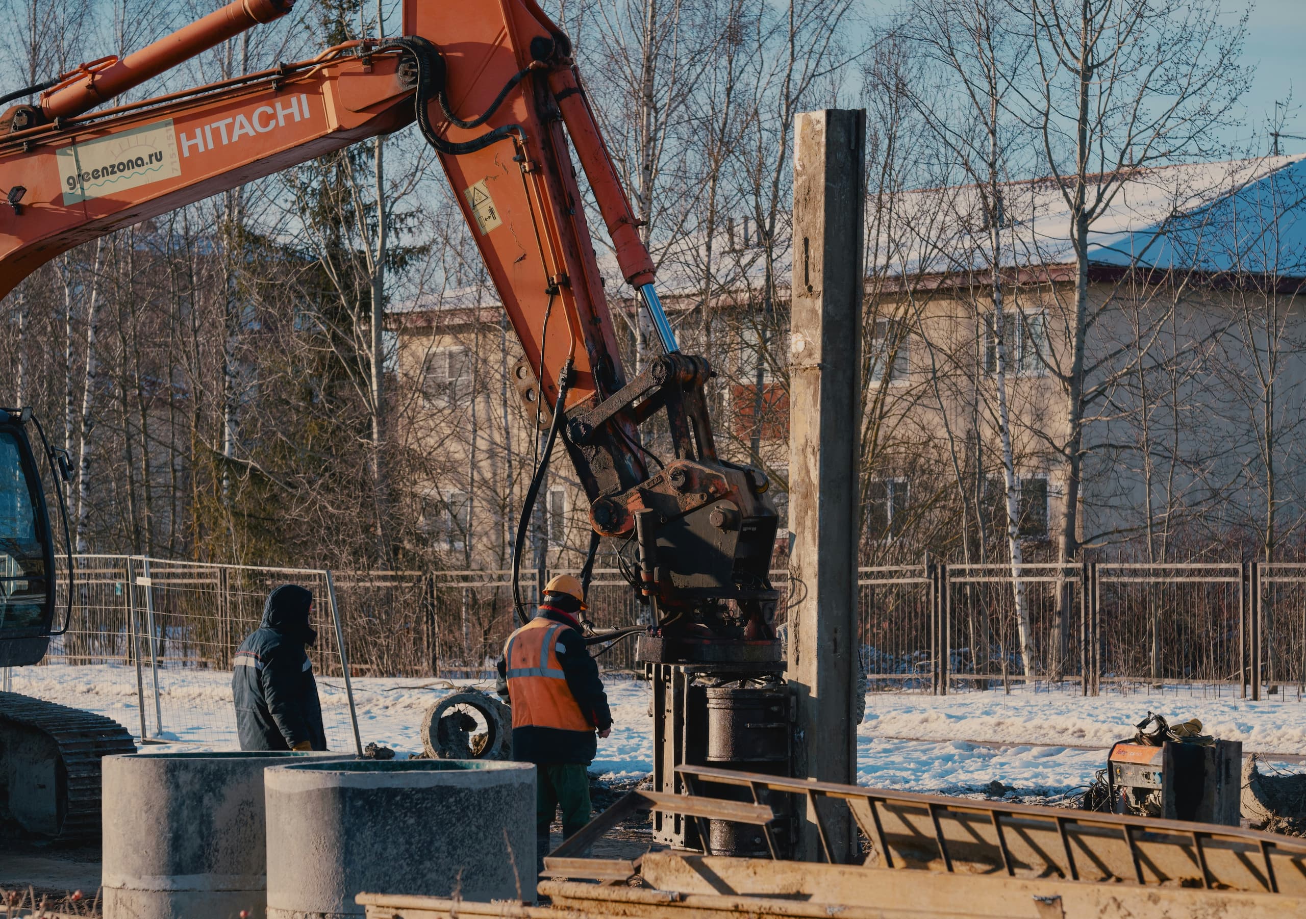 Excavator preparing a site for foundation work