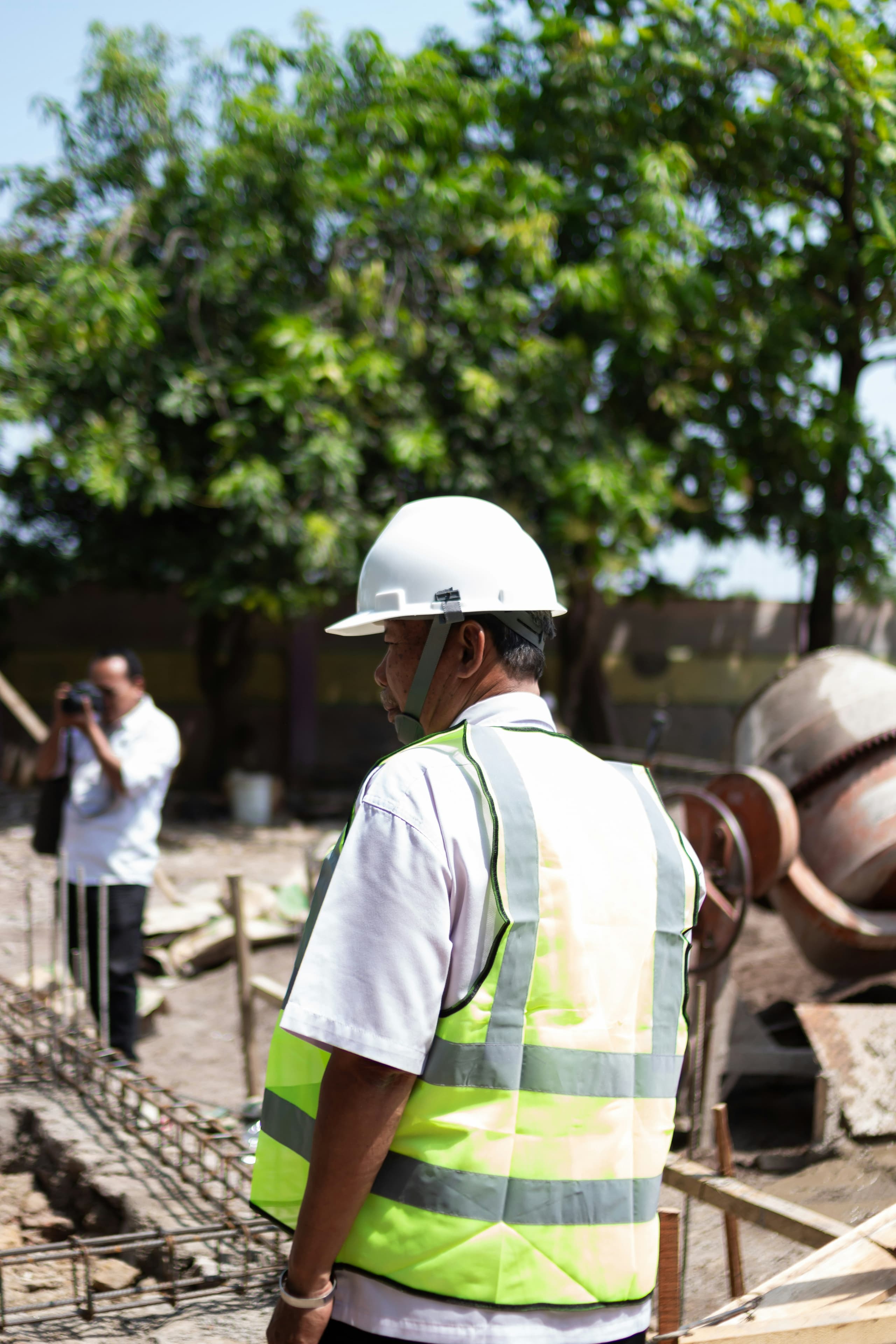 Construction foreman checking work on site